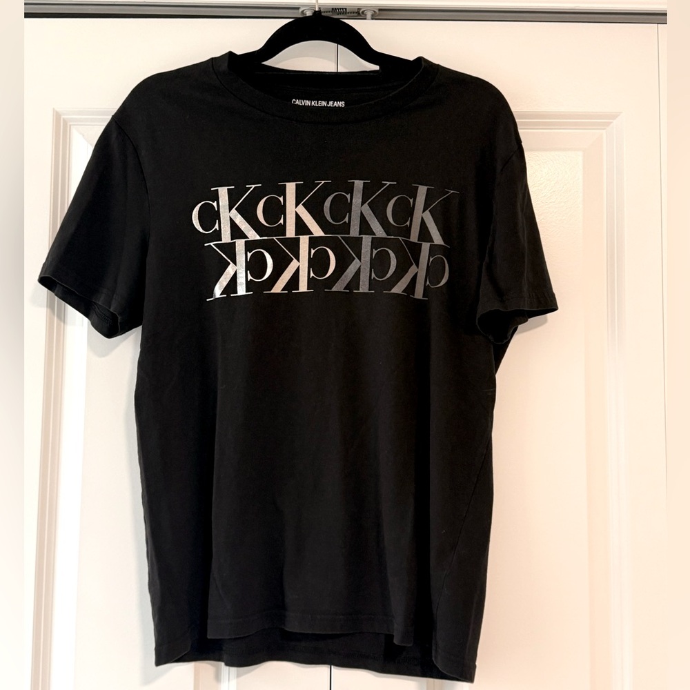 Calvin Klein Men's Black Tee with Silver Logo Size M